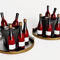 Wine Bottles and Wine Glasses with Ice Buckets and Ice Cubes on Gold Trays
