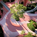 Modern Children's Play Area With Green Trees Slide Colorful Curved Paths And Seats