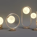 Modern Table Lamp with Circular Golden Frame and Moon Shaped Illuminated Globe on Brown Base
