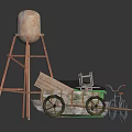 Vintage Water Tower With Metal Frame And Wooden Wheelbarrow Near Green Box