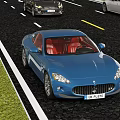 Luxury Blue Maserati Sports Car With Red Interior Driving On Road