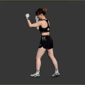 Man in Black Sportswear with Boxing Gloves Ready to Box in Gray Background