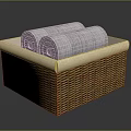 Woven Storage Basket With Beige Lining And Rolled Gray Towels