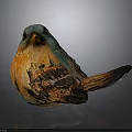 Colorful Handcrafted Bird Sculpture Featuring Blue Head Orange Body and Brown Wings