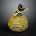 Handcrafted Pottery Jar With Yellow Black Spiral Stripes And Twisted Rope Knot Top Decoration