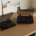 Decorative Ornament Set With Two Black Vinyl Record Players On Wooden Tabletop