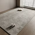 Soft Gray Square Carpet On Wooden Floor With Books And Candles Near Window