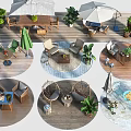 Outdoor Table And Chair Sets In Garden Patio With Umbrellas And Green Plants