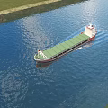 Beautiful Garden Ornaments Along Canal With Lush Green Vegetation And Calm Water Surface