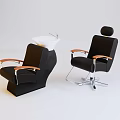 Modern Black Massage Chair With Orange Armrests And Metal Base Design