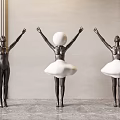 Three Black Body Sculpture Carvings With Raised Arms And Central White Cloud Shaped Skirt