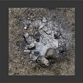 Outdoor Campfire Setup With Stones Ash Dirt And Dry Grass In Square Area
