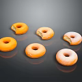 Six Fresh Bitten Donuts With Orange Glaze And Sugar Coated On Black Background