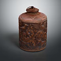Brown Decorative Storage Jar With Carved Animal Patterns And Ring Shaped Lid