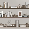 Decorative Ornament Combination on Bookshelves with Books Vases Sculptures and Minimalist Decor Items