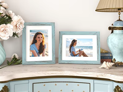 Two Decorative Light Blue Photo Frames With Seaside Photos On Dresser With Flowers And Seashells 3d model