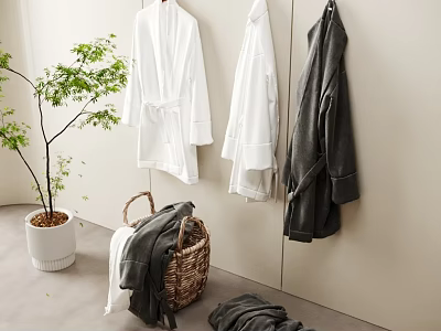 Soft White Gray Bathrobes Towels Hanging On Wall With Basket Folded Clothes And Green Plant 3d model