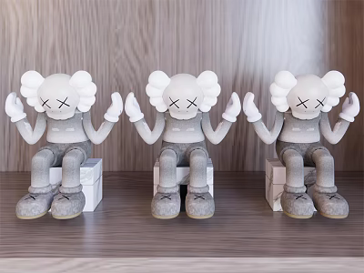 Gray Cartoon Like Ornament Decor Set With Three Sitting Figures And Square Base 3d model