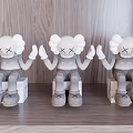 Gray Cartoon Like Ornament Decor Set With Three Sitting Figures And Square Base 3d model