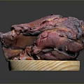 Tender Roasted Animal Meat Presented on Wooden Platter with Juicy Red Texture