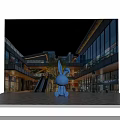 Blue Rabbit Inflatable Model In Outdoor Commercial Plaza At Night With Buildings Escalator And Lighting
