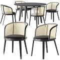 Round Black Wood Dining Table With Four Woven Back Dark Frame Chairs 3d model