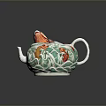 Decorative Teapot With Colorful Fish Patterns And Green Orange Wave Designs