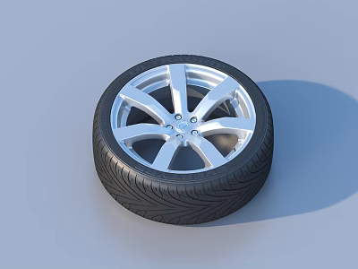 Modern Car Tire with Silver Alloy Spoke Wheel and Deep Tread Pattern 3d model