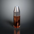 Copper Cased Bullet With Silver Top Shiny Surface On Black Background