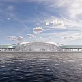 Grand Modern Arch Building With Glass Facade By Waterfront And Blue Sky