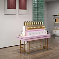 Pink Display Shelf With Golden Bottles White Boxes And Golden Frame On Wooden Floor