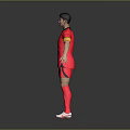 Game Movie Character In Red Sports Uniform With Yellow Armband And White Shoes Standing Pose