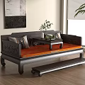 Traditional Chinese Luohan Bed With Carved Wooden Frame Cushions And Small Tea Table In Interior