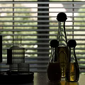 Marble Tabletop Display With Glassware Tray Candle Holders And Wooden Lid Liquid Bottles