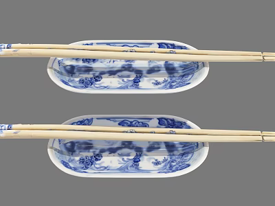 Traditional Blue And White Porcelain Plates With Wooden Chopsticks And Floral Patterns 3d model