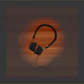 Black Over Ear Headphones on Wooden Tabletop with Comfortable Headband and Wired Connection