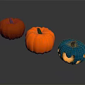 Three Colorful Fresh Pumpkins Orange And Blue Vegetables With Carved Smile Design