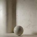 Beige Textured Wall Corner Featuring Spherical Decorative Component