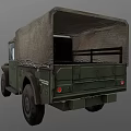 Vintage Green Military Truck With Canvas Top And Front Grille Design