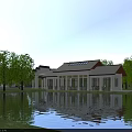 Aerial View Of Illuminated School Building With Courtyard Trees And Water Surroundings