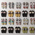 Assorted Pairs Of Colorful Home Slippers With Various Printed Designs And Comfortable Fit