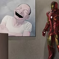 Contemporary Interior Featuring Red Iron Man Figure Shelving Unit With Dolls Decorations Table And Chairs