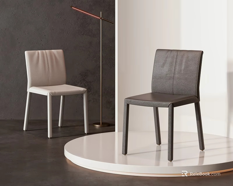 Modern Light And Dark Upholstered Single Chairs With Sleek Design On White Display Platform 3d model 