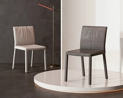 Modern Light And Dark Upholstered Single Chairs With Sleek Design On White Display Platform 3d model
