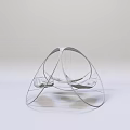 Modern Hanging Chair With Curved Metal Frame And White Cushioned Seat