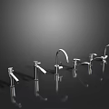 Multiple Silver Faucets in Various Styles on Black Background with Shiny Surface and Reflections 3d model