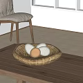 Nest Shaped Straw Decorative Ornament Set With White And Brown Eggs On Wooden Table