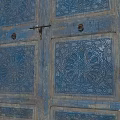 Pair of Vintage Blue Wooden Doors with Carved Patterns and Distressed Finish