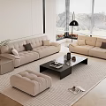 Modern Living Room With Beige Sofa Black Coffee Table And Area Rug
