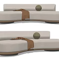 Modern Beige Upholstered Sectional Sofa With Wooden Base Throw Blanket And Decorative Ball